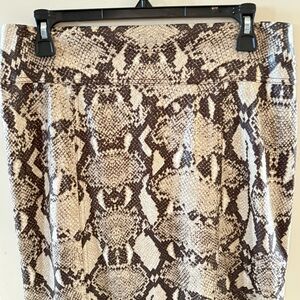 Chico's Brown‎ Snakeskin pencil skirt , mini to mid length zips in back.